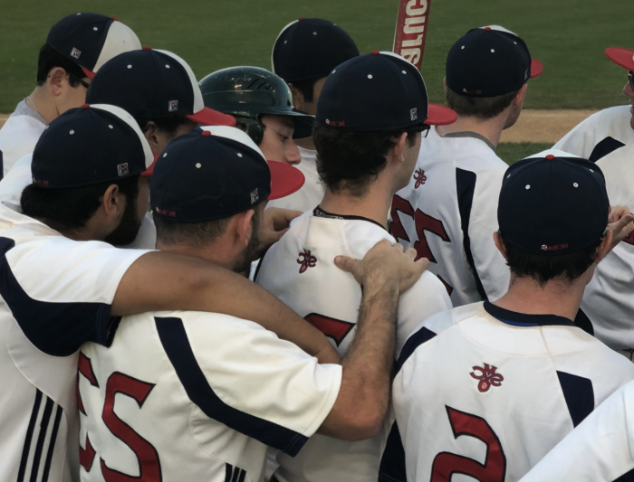 Baseball players huddling